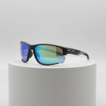 Sport sunglasses with wrap design and reflective lenses, left side view